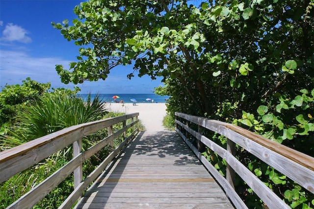 view of community featuring a view of the beach and a water view