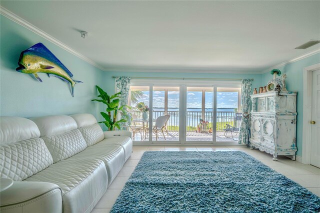 living room with crown molding and light tile patterned floors