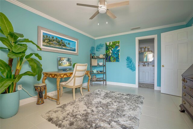 tiled office space featuring ceiling fan and ornamental molding