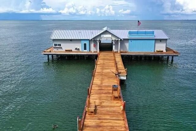 view of dock with a water view