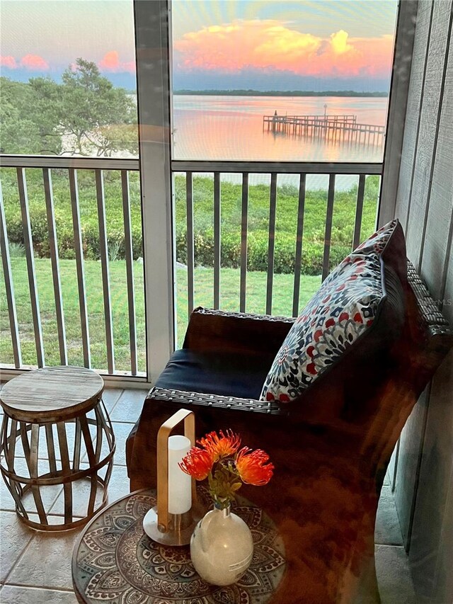 balcony at dusk with a water view