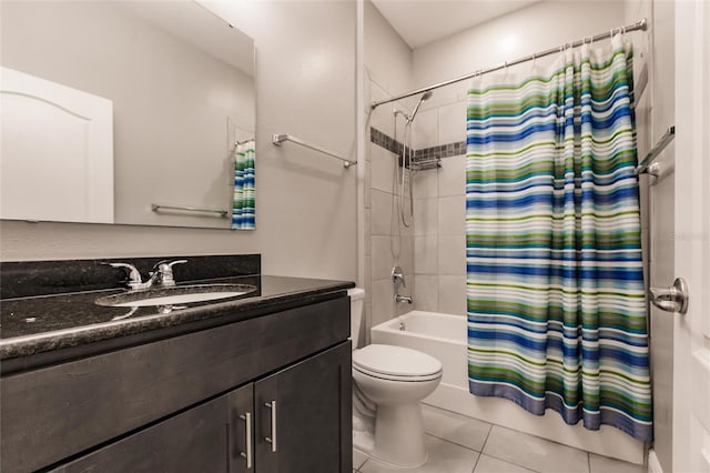 full bathroom with shower / tub combo with curtain, vanity, toilet, and tile patterned flooring