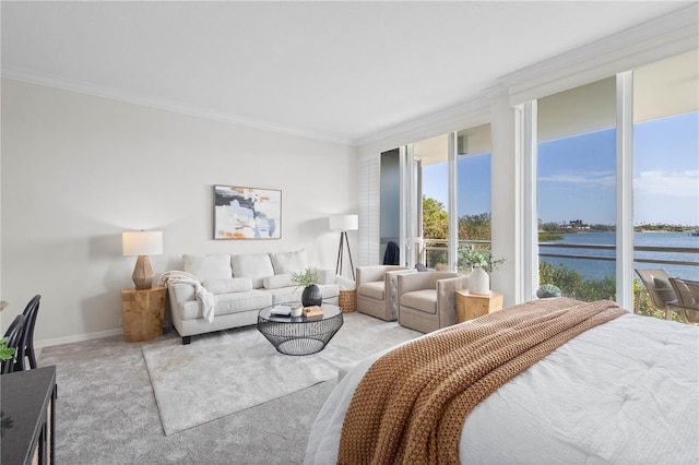 bedroom featuring light colored carpet, a water view, and ornamental molding