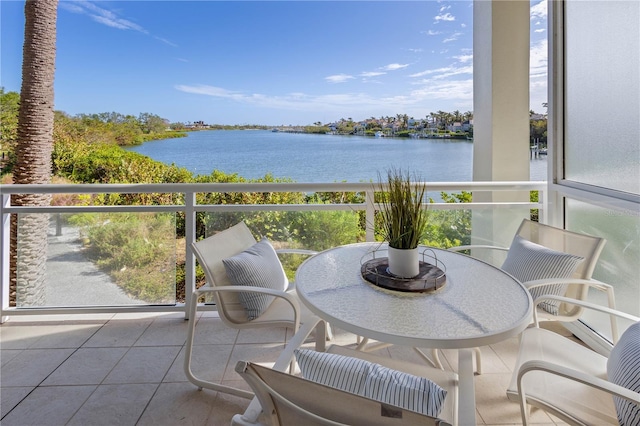 balcony featuring a water view