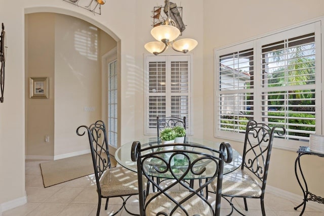 tiled dining room with plenty of natural light