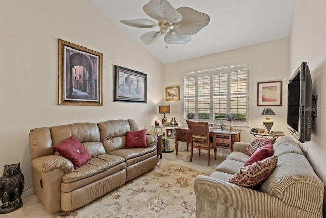 living room featuring ceiling fan, vaulted ceiling, and light tile patterned floors