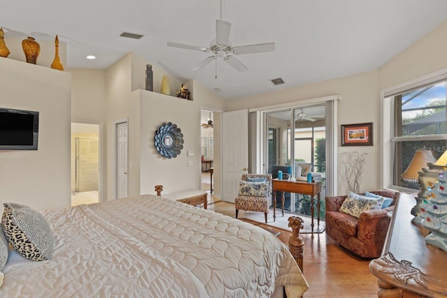 bedroom with hardwood / wood-style floors, high vaulted ceiling, ceiling fan, and access to exterior