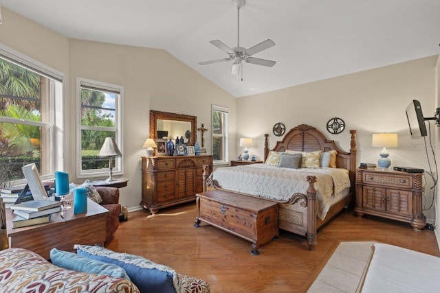 bedroom featuring vaulted ceiling, ceiling fan, and hardwood / wood-style flooring