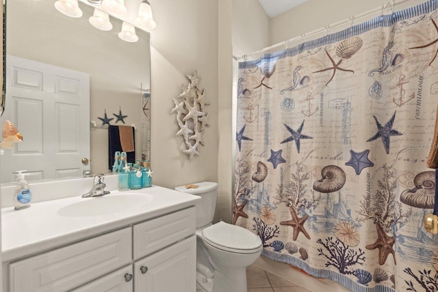 bathroom with curtained shower, toilet, tile patterned flooring, and vanity