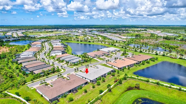 bird's eye view with a water view