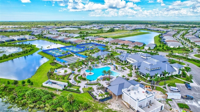 birds eye view of property featuring a water view