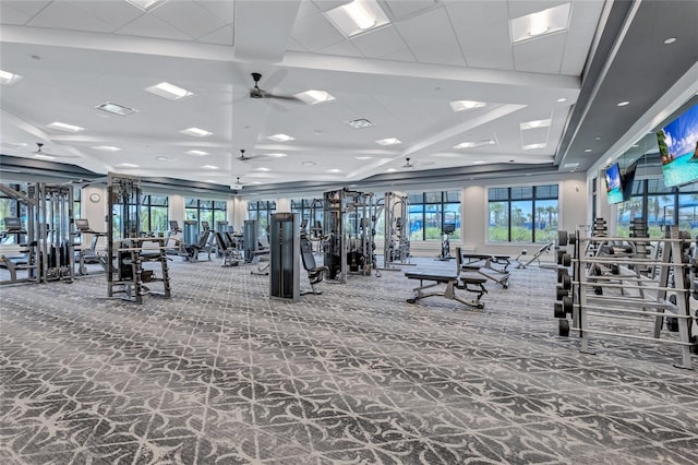 workout area with carpet and ceiling fan