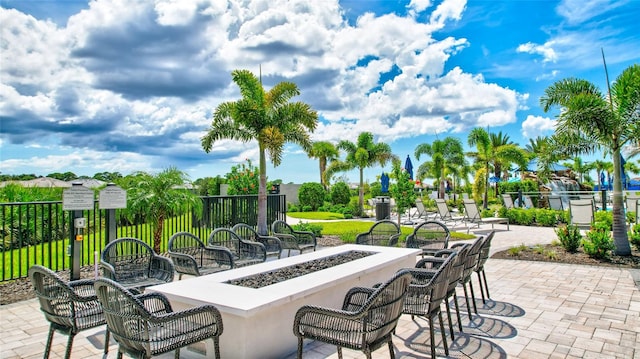 view of patio with a fire pit