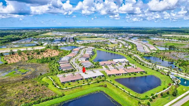 drone / aerial view featuring a water view