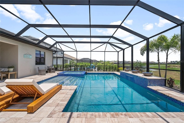 view of swimming pool with a patio area and glass enclosure