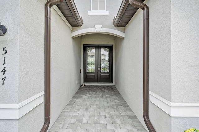 view of exterior entry with french doors