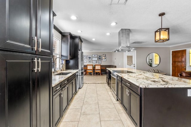 kitchen featuring light tile patterned flooring, sink, ornamental molding, decorative light fixtures, and island exhaust hood