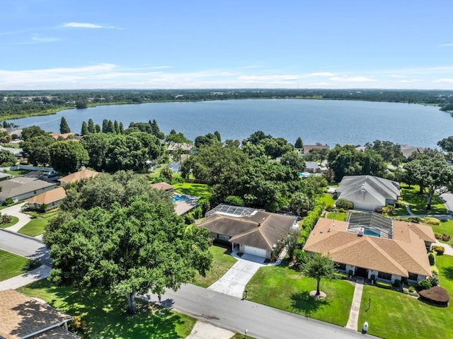 birds eye view of property featuring a water view