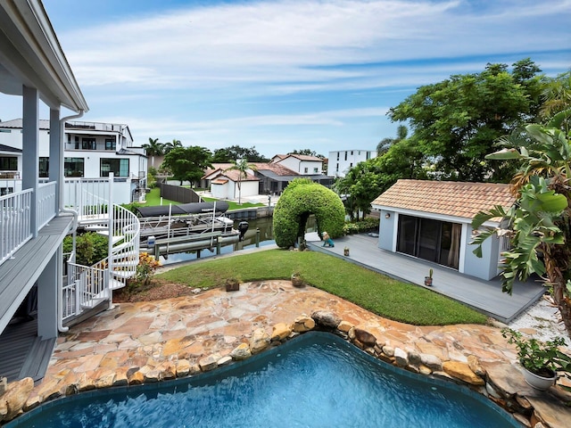 1400 Quail Dr, Sarasota, FL 34231 - exterior space featuring an outdoor pool, boat lift, a residential view, stairs, and a patio area