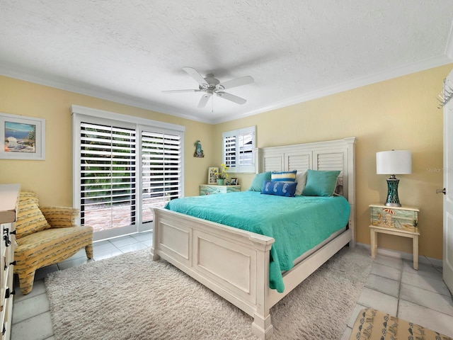 1400 Quail Dr, Sarasota, FL 34231 - bedroom with access to outside, multiple windows, crown molding, and a textured ceiling
