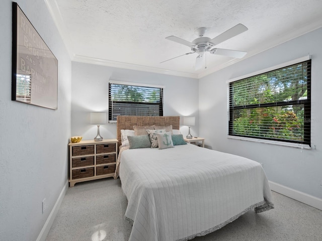 1400 Quail Dr, Sarasota, FL 34231 - bedroom with light speckled floor, a textured ceiling, a ceiling fan, baseboards, and ornamental molding