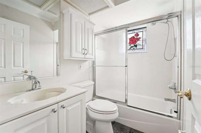 full bathroom featuring tile patterned flooring, vanity, toilet, and enclosed tub / shower combo