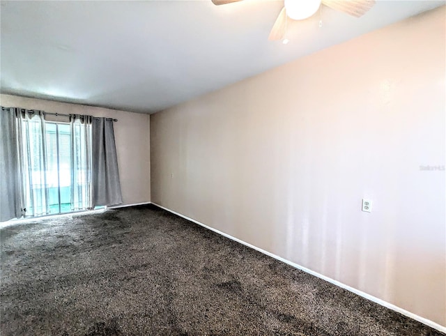 spare room with carpet flooring and ceiling fan