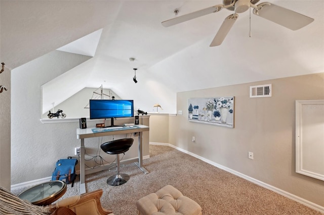 carpeted office space featuring lofted ceiling and ceiling fan