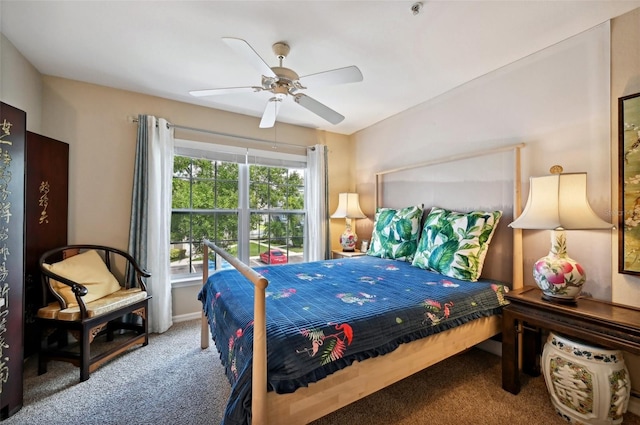 bedroom with ceiling fan and carpet floors