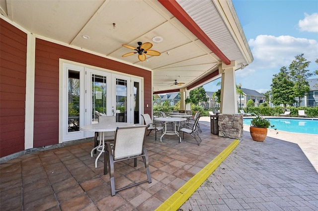 view of patio / terrace featuring french doors and ceiling fan