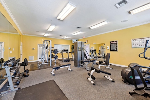 gym featuring crown molding