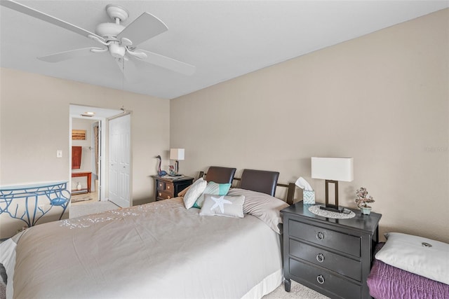 bedroom featuring ceiling fan and light carpet