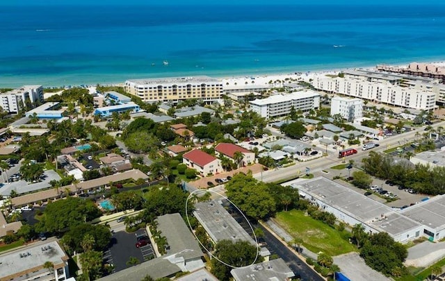 bird's eye view with a view of the beach and a water view