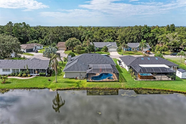 birds eye view of property featuring a water view