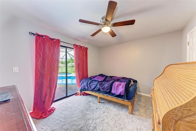 carpeted bedroom with ceiling fan and access to outside