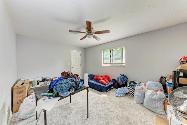 playroom featuring ceiling fan and light colored carpet