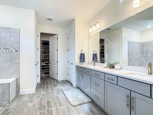 bathroom featuring wood-type flooring and vanity