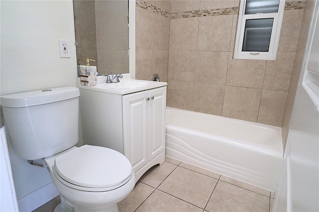 full bathroom with vanity, toilet, tiled shower / bath combo, and tile patterned floors