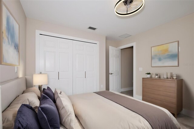 bedroom featuring a closet and carpet