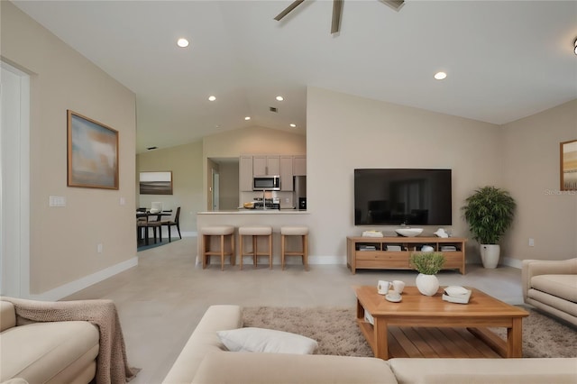 living room with recessed lighting, baseboards, a ceiling fan, and vaulted ceiling