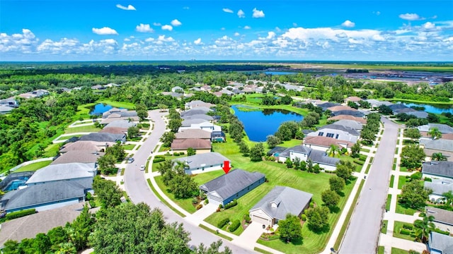 drone / aerial view with a water view