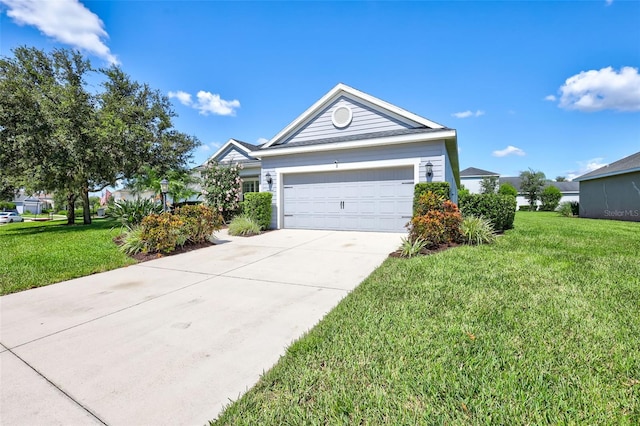 view of front of house featuring a front yard and a garage