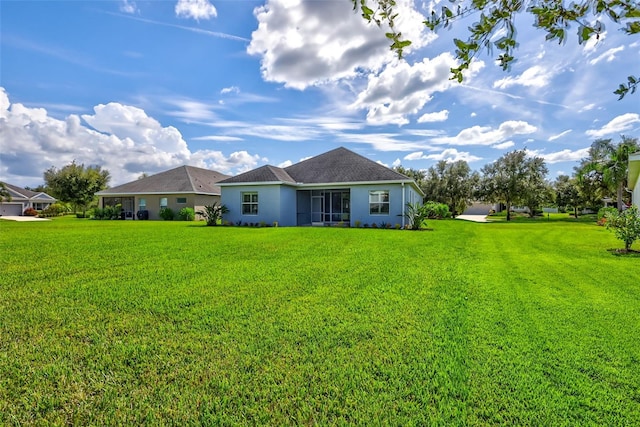 view of front of property with a front lawn