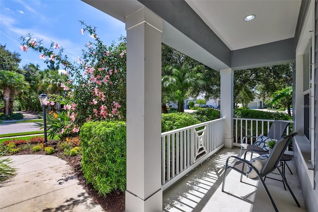 balcony featuring covered porch