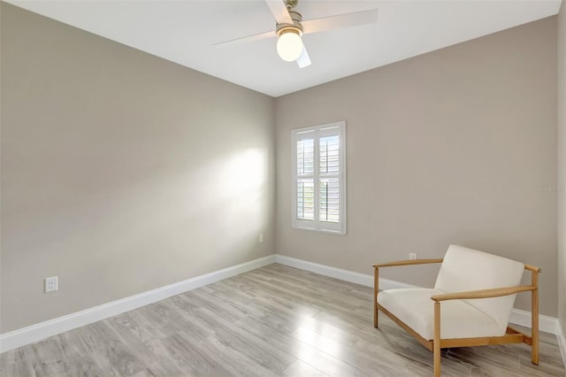 unfurnished room featuring light hardwood / wood-style floors and ceiling fan