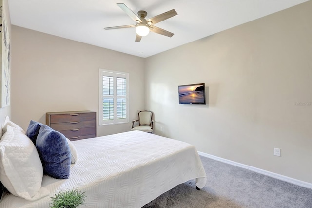 bedroom featuring ceiling fan and light colored carpet