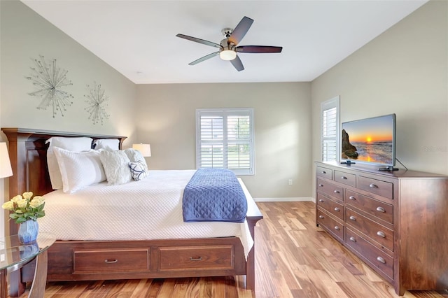 bedroom with ceiling fan and light wood-type flooring