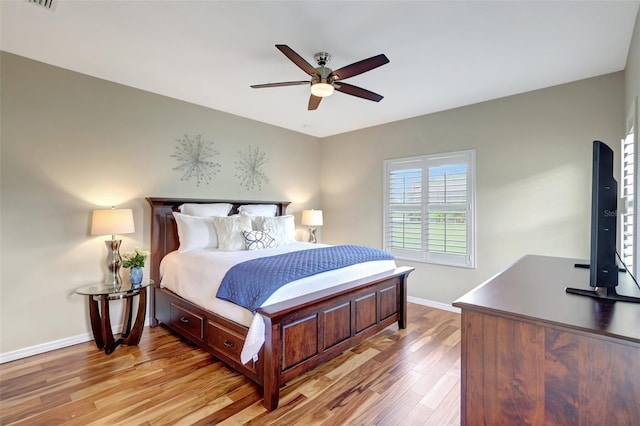 bedroom featuring ceiling fan and light hardwood / wood-style flooring