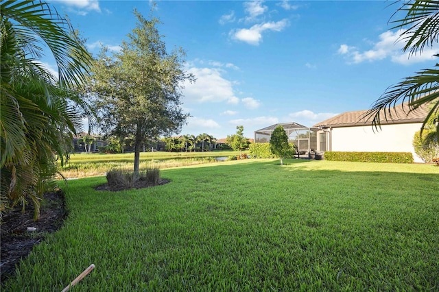 view of yard featuring a lanai