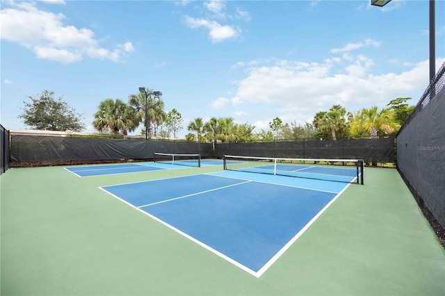 view of tennis court with basketball court